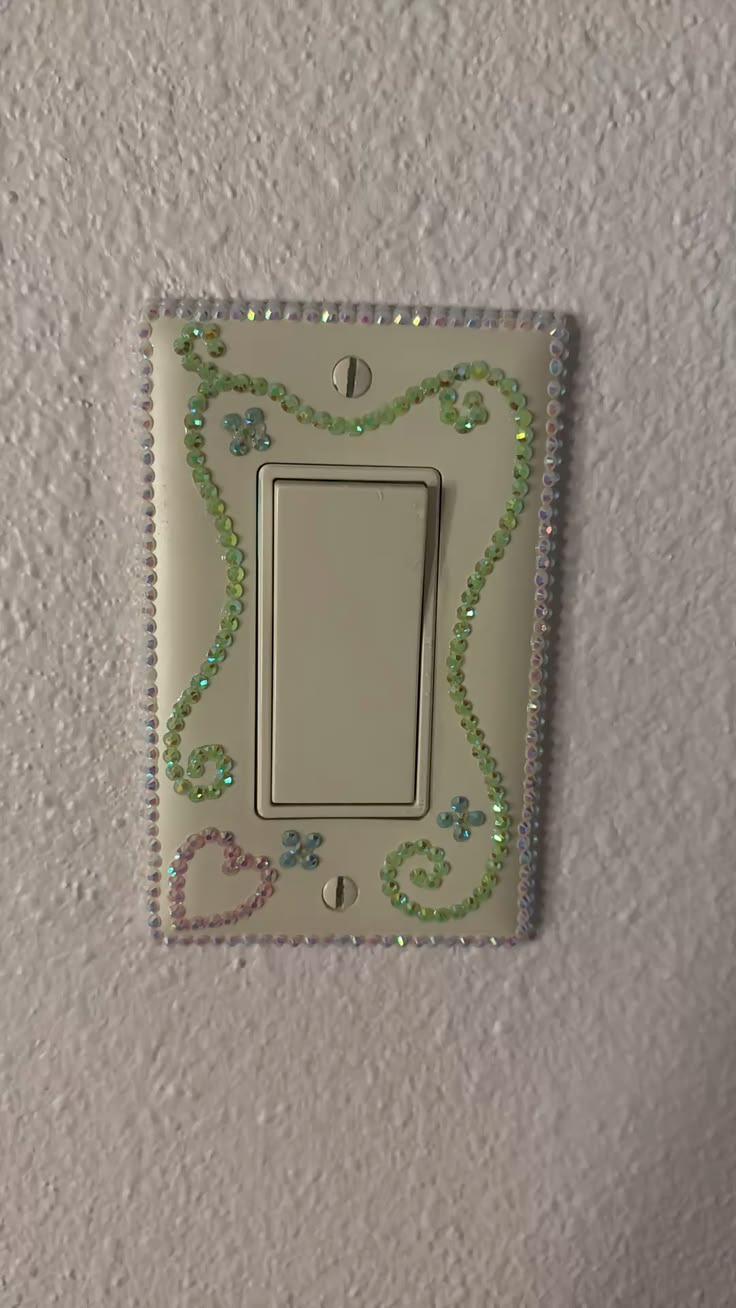 Glam style light switch plate fully covered in clear rhinestones